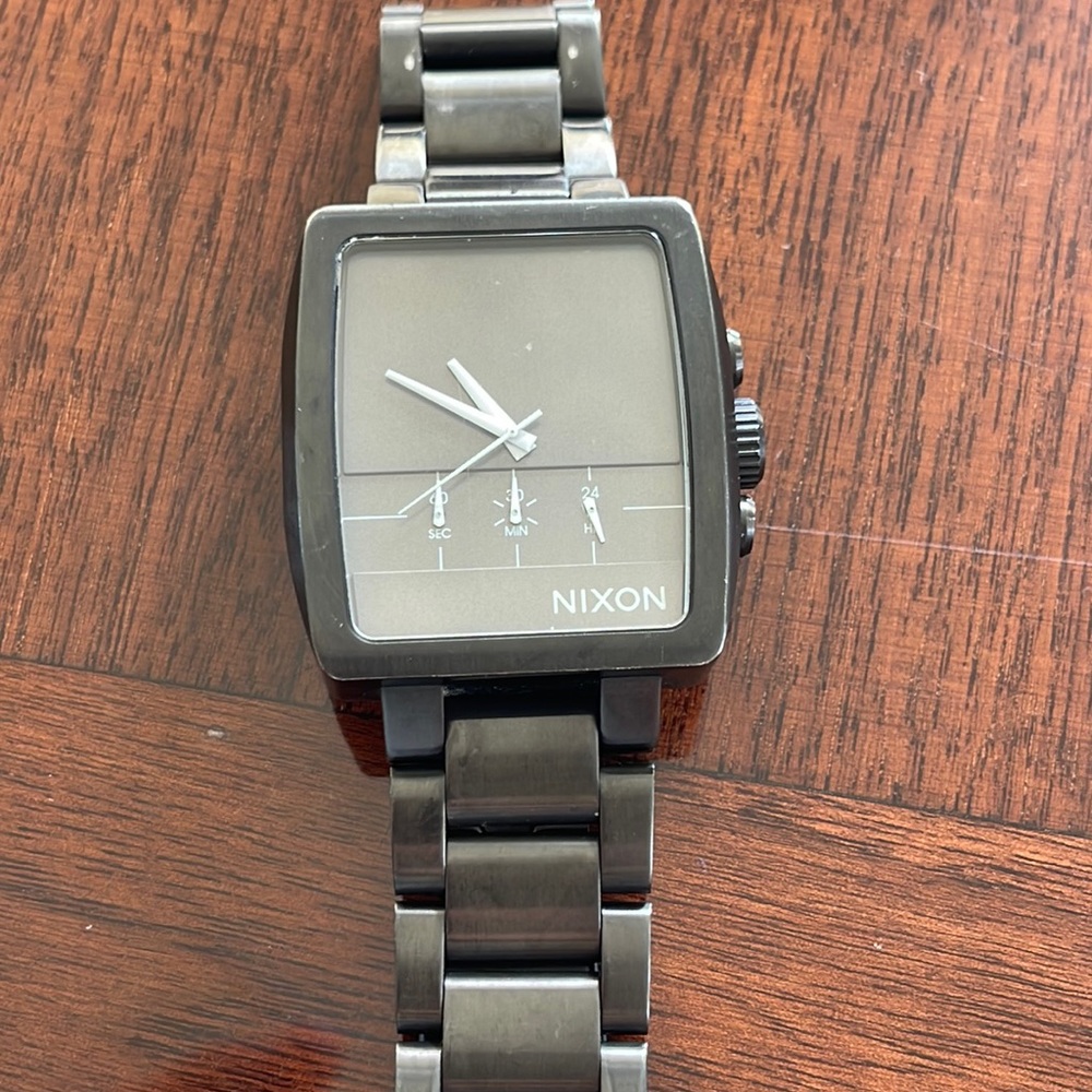Men’s Nixon watch model “The Axis”.  100% stainless steel with Japan movement.